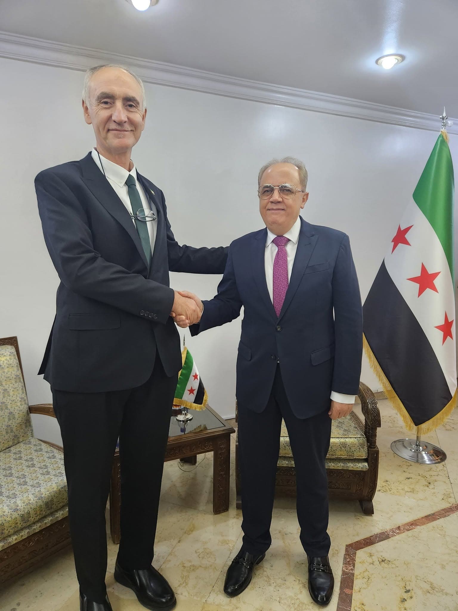 Dr Assem Al Alwani meeting with Syrian officials, representing AFSSA