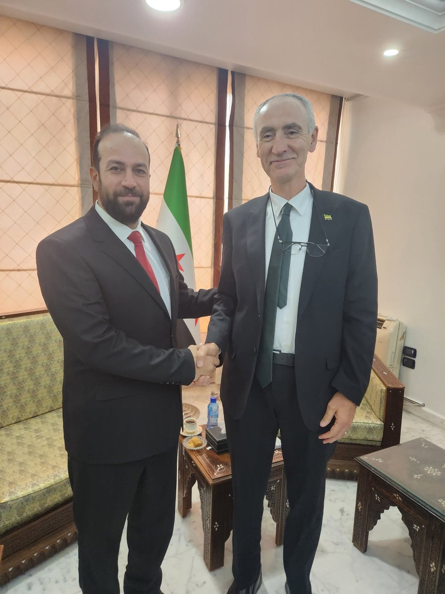 Dr Assem Al Alwani meeting with Syrian officials, representing AFSSA